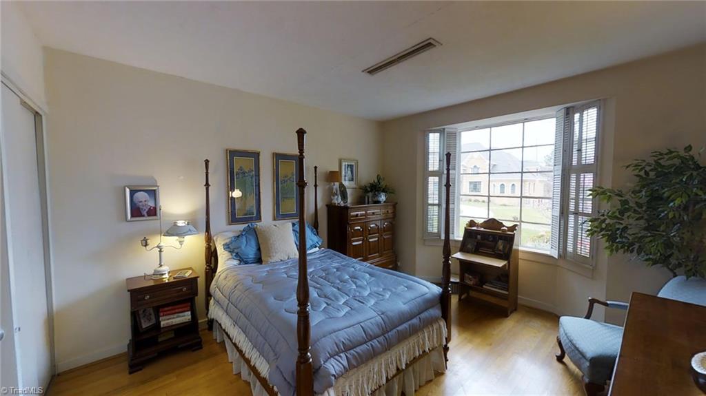 1104 Rockford Road High Point, NC 27262 - Photo 20 of 30 A second bedroom located on the main level. Beautiful hardwood floors and picture window that overlooks a wonderfully landscaped yard.