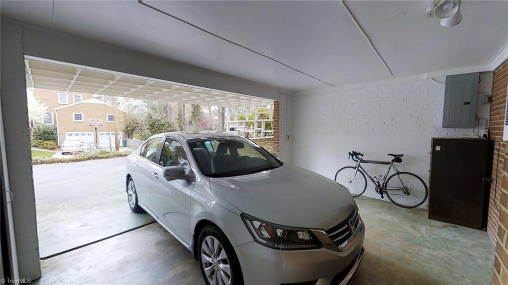 1104 Rockford Road High Point, NC 27262 - Photo 29 of 30 2 Car Carport that leads into the lower level Den.
