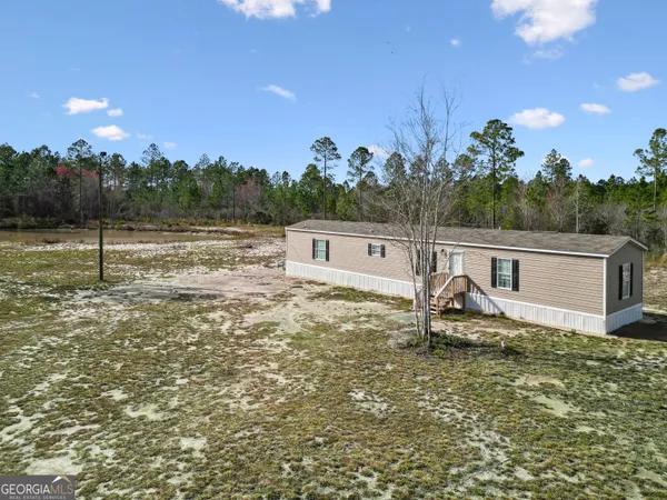 a house view with a outdoor space