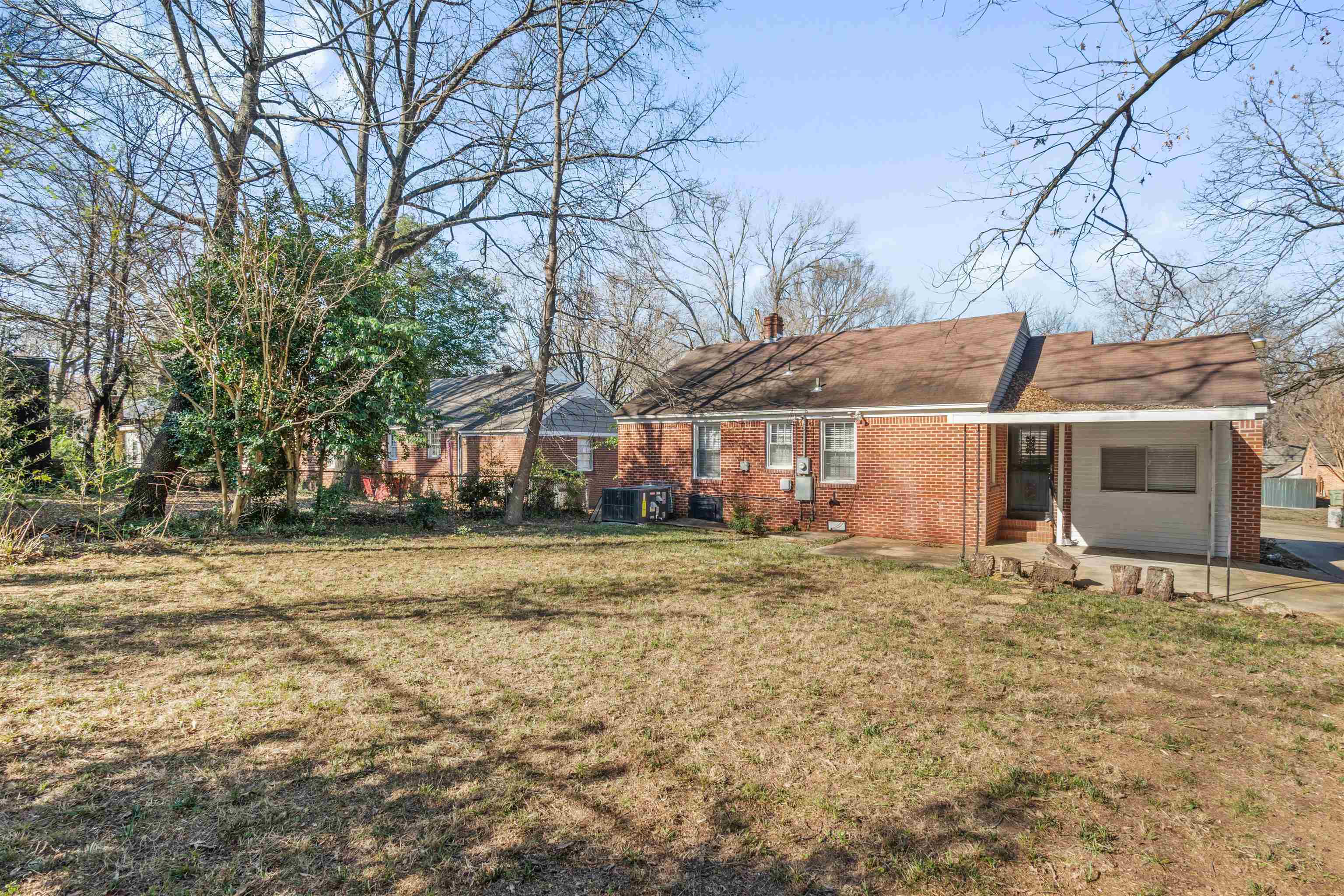 3753 Friar Tuck Road Memphis, TN 38111 - Photo 22 of 23 a front view of a house with a yard