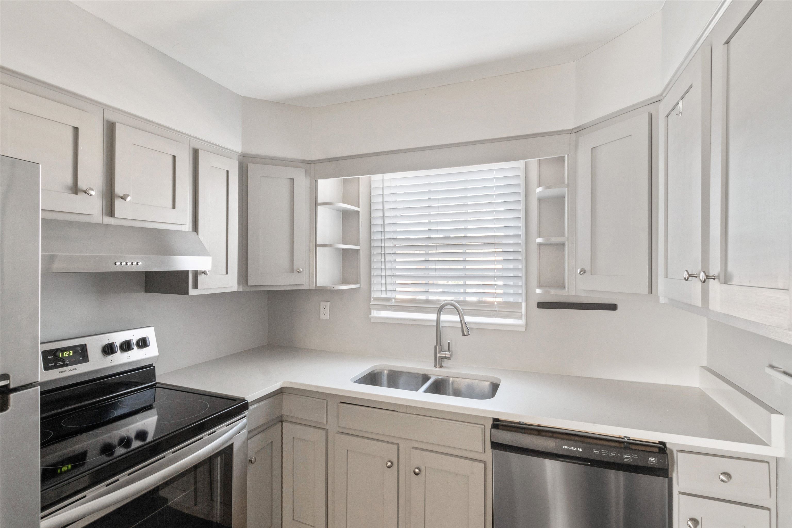 3753 Friar Tuck Road Memphis, TN 38111 - Photo 10 of 23 a kitchen with appliances cabinets and a window
