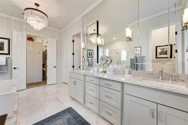 a bathroom with a bathtub and a sink
