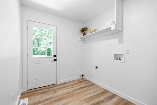 a view of small space with wooden floor
