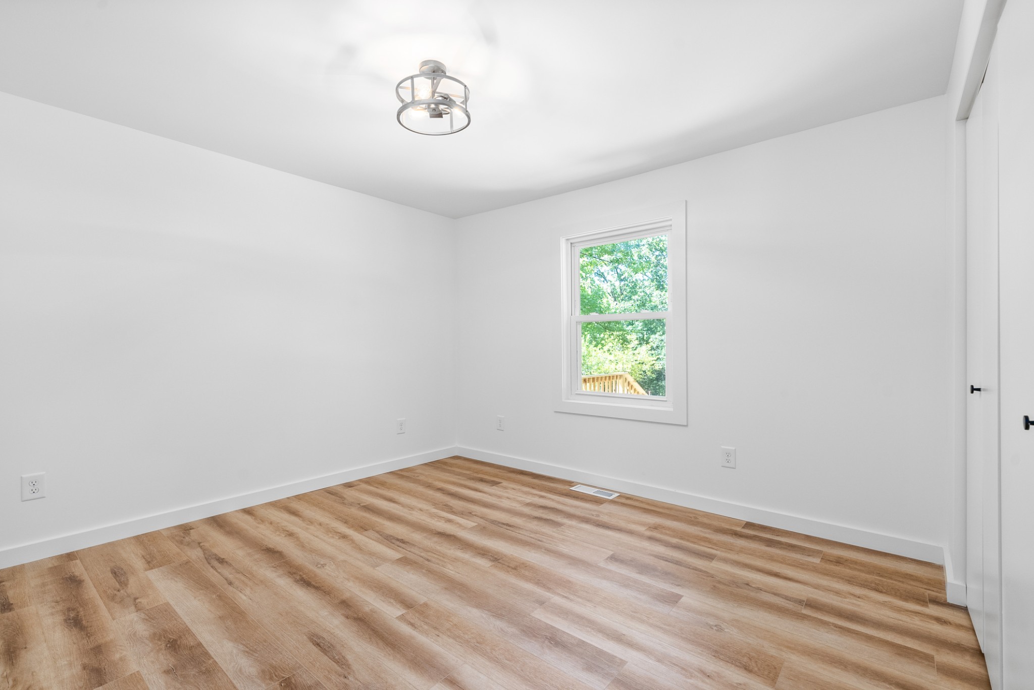 1120 Kingston Springs Road Kingston Springs, TN 37082 - Photo 13 of 20 an empty room with a window