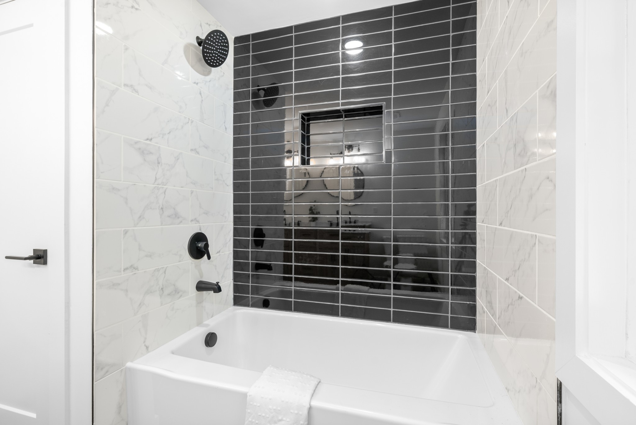 1120 Kingston Springs Road Kingston Springs, TN 37082 - Photo 16 of 20 a bathroom with a bathtub and a shower