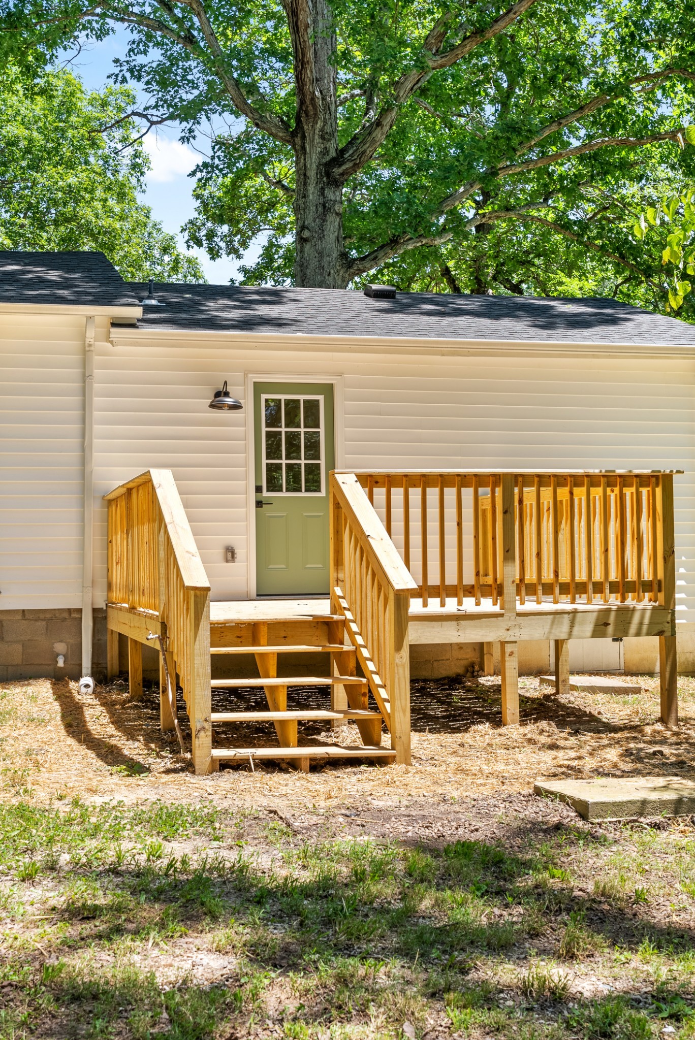 1120 Kingston Springs Road Kingston Springs, TN 37082 - Photo 20 of 20 a view of a backyard with a small deck