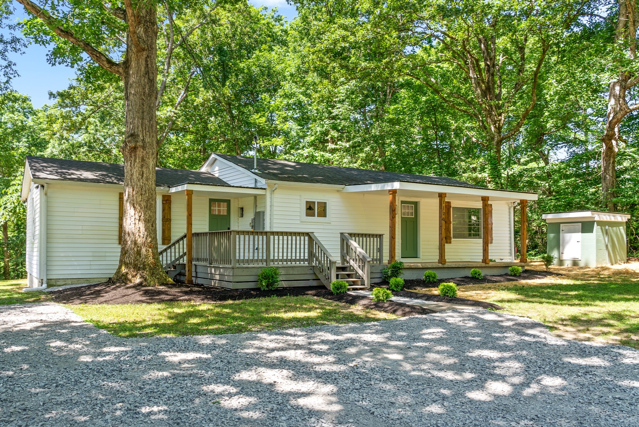 1120 Kingston Springs Road Kingston Springs, TN 37082 - Photo 2 of 20 a front view of a house with a yard