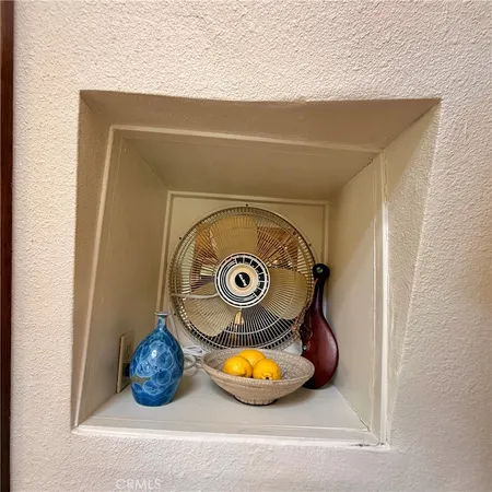 a bedroom with a bed and a shower