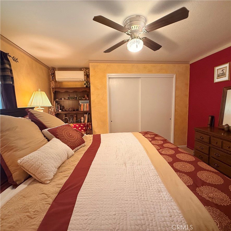 2877 Trower Road Catheys Valley, CA 95306 - Photo 45 of 68 Bedroom #2 has a king sized bed in it with a cute hutch area.