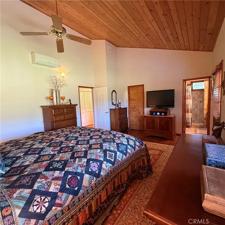 a kitchen with a sink cabinets and a window