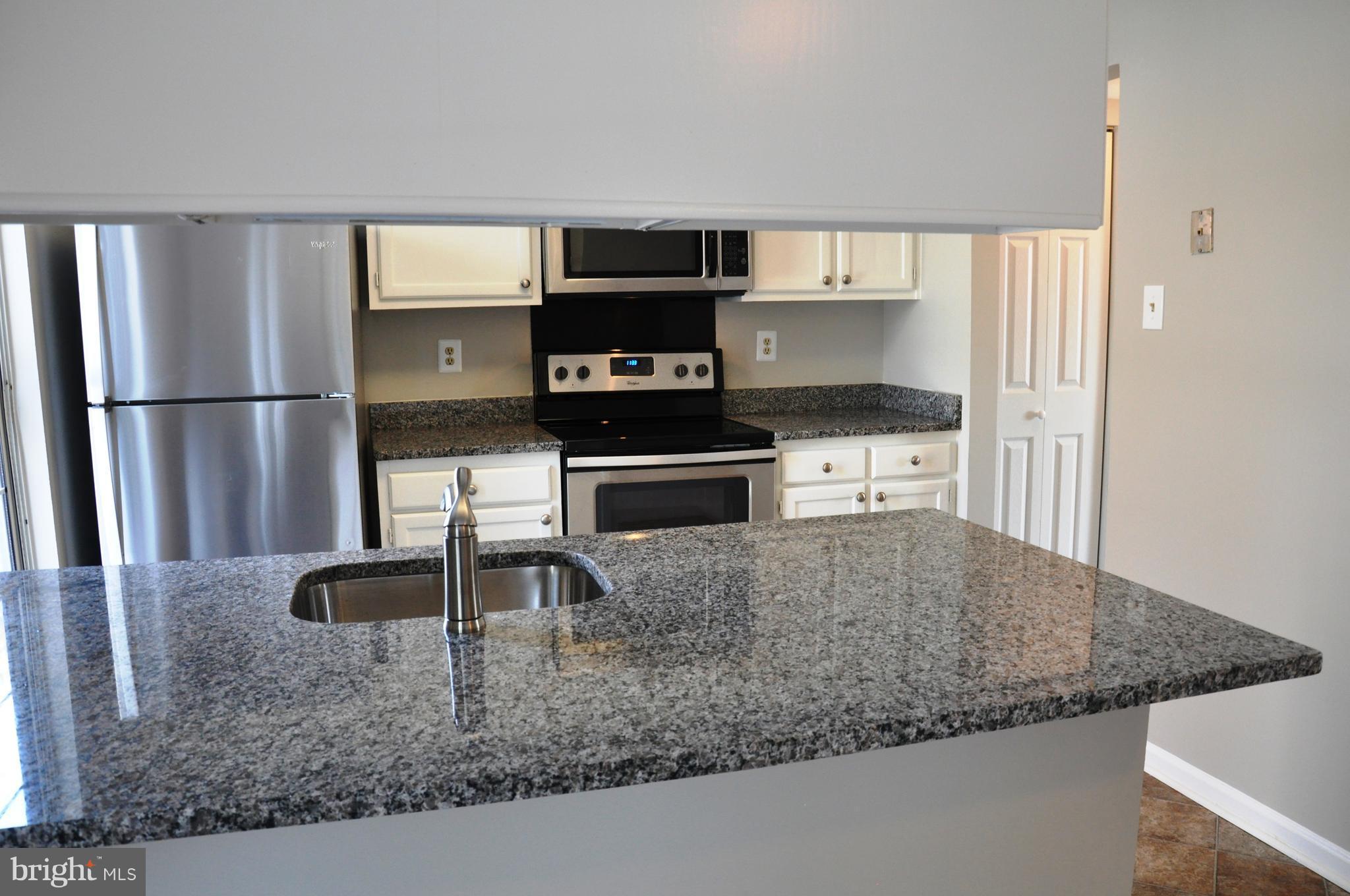 15122 Callohan Court Silver Spring, MD 20906 - Photo 12 of 29 You will love this brand new granite.