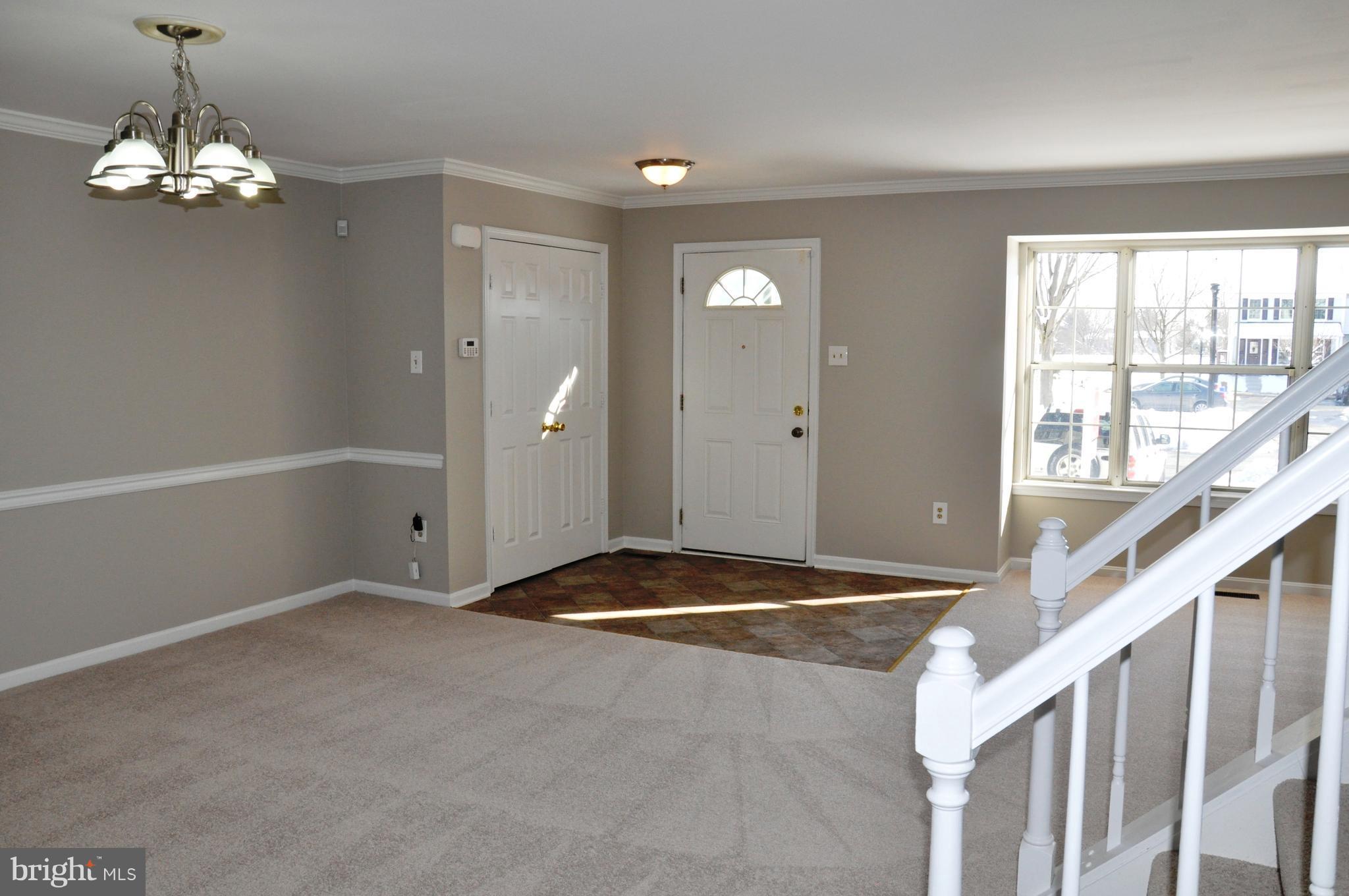 15122 Callohan Court Silver Spring, MD 20906 - Photo 13 of 29 View from stairs into living and dining areas.
