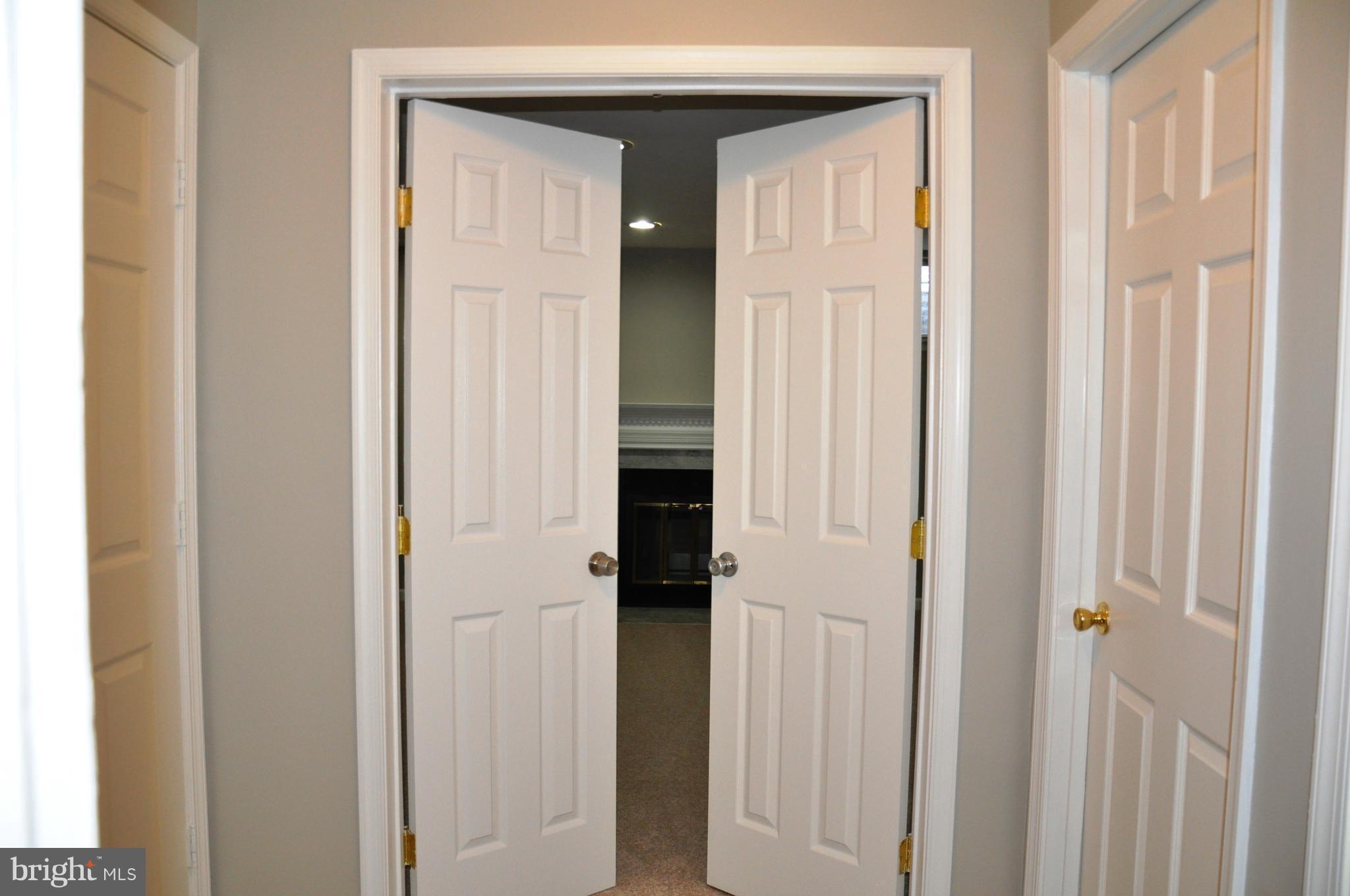 15122 Callohan Court Silver Spring, MD 20906 - Photo 21 of 29 French doors into lower level family room.