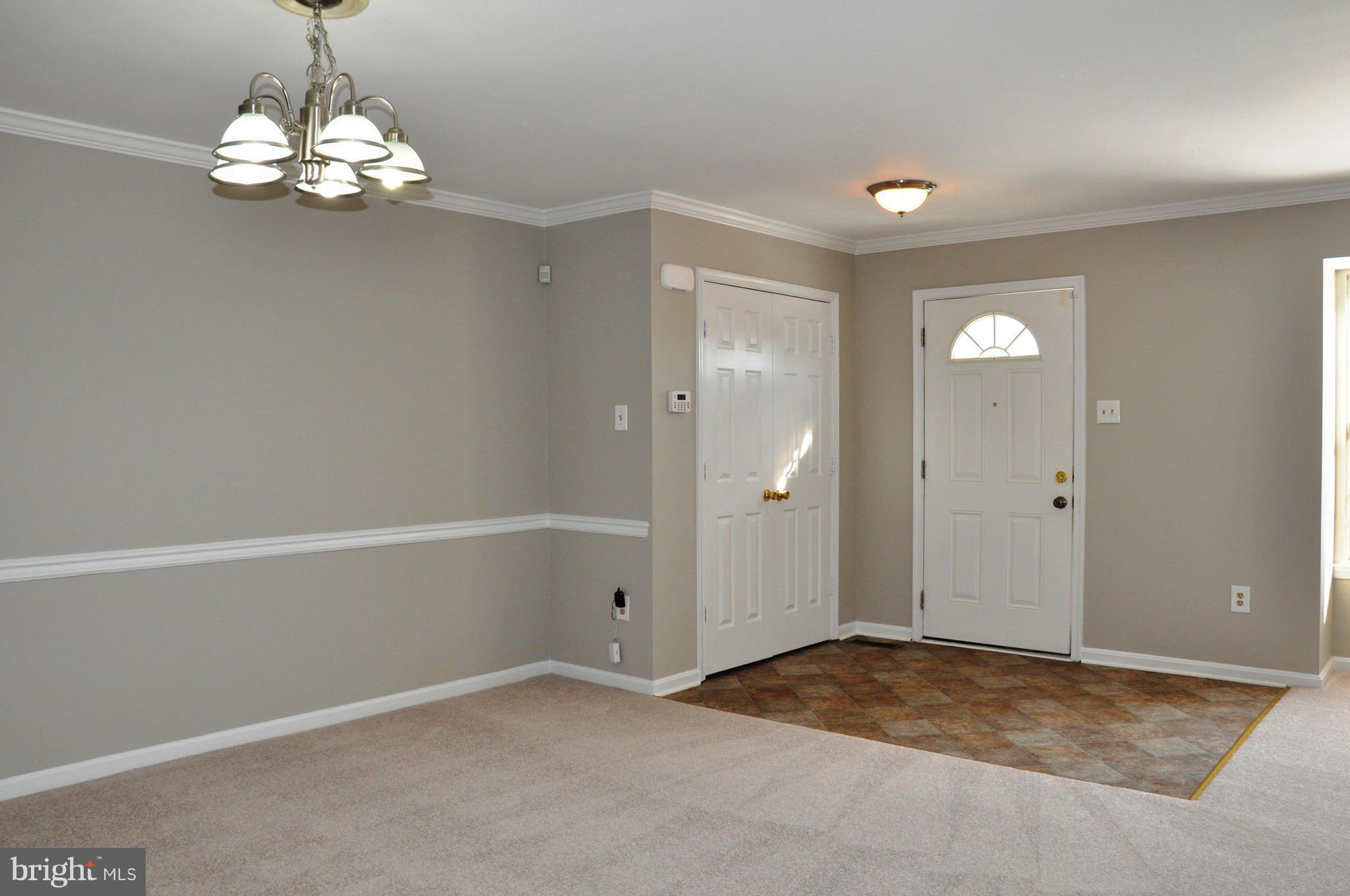 15122 Callohan Court Silver Spring, MD 20906 - Photo 5 of 29 Foyer and dining area with big closet.
