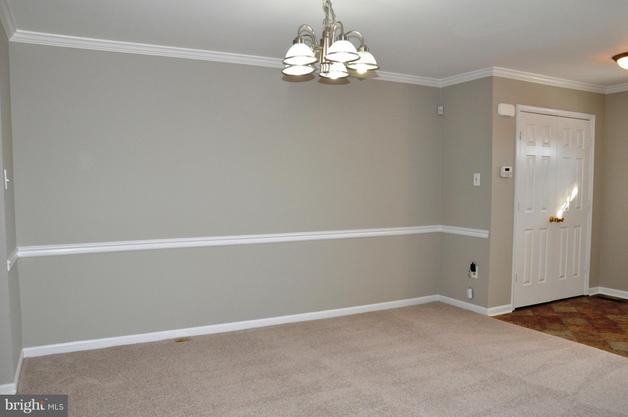 15122 Callohan Court Silver Spring, MD 20906 - Photo 6 of 29 Dining area with brand new chandelier.