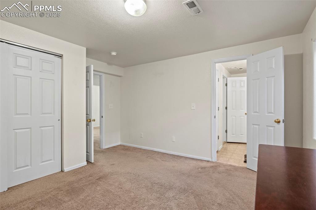4806 Rusty Nail Point, Unit 101 Colorado Springs, CO 80916 - Photo 29 of 39 a view of an empty room
