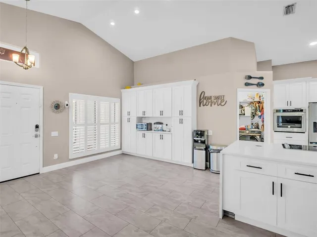 $425,000 | 1703 Blue Lake Court, Tarpon Springs, FL 34689