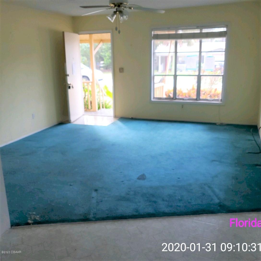 102 Rains Drive Ponce Inlet, FL 32127 - Photo 3 of 9 Living Room