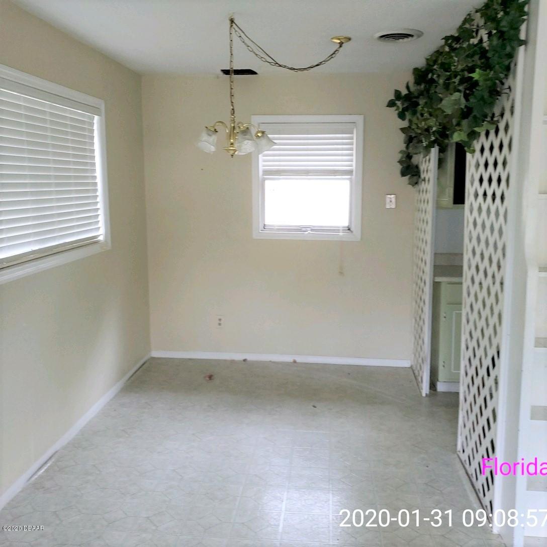 102 Rains Drive Ponce Inlet, FL 32127 - Photo 4 of 9 Dining Room