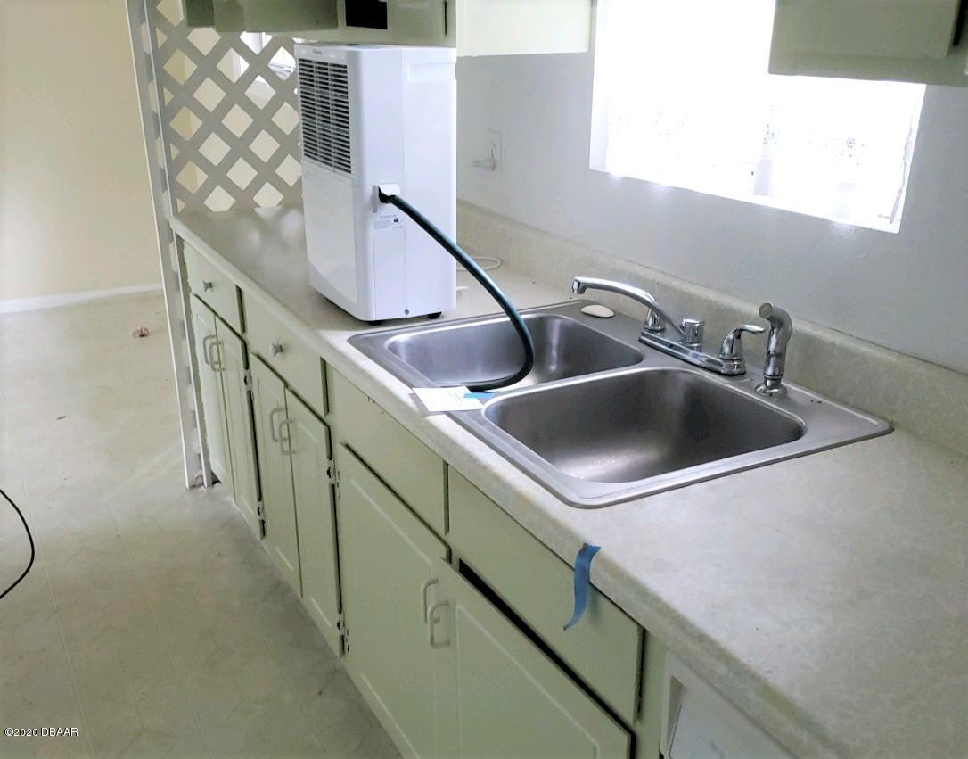 102 Rains Drive Ponce Inlet, FL 32127 - Photo 5 of 9 Kitchen