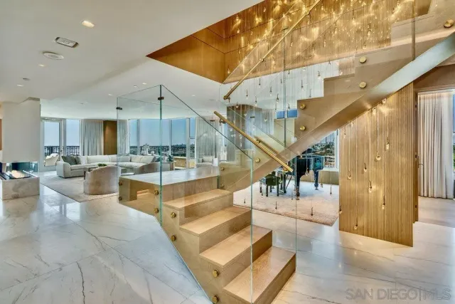 a view of entryway and hall with dining room