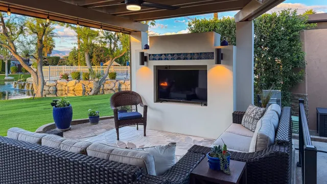 a patio with yard table and chairs