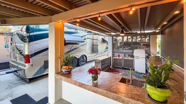 a view of gym equipment and living room