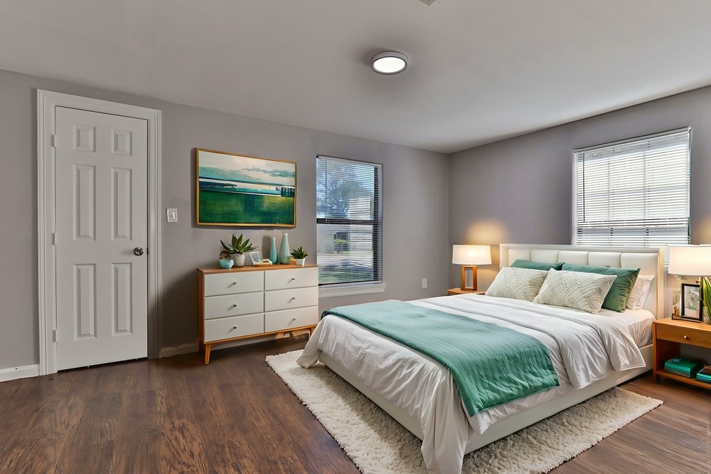 218 3 Rd Street Brazoria, TX 77422 - Photo 14 of 19 a room with a bed and a flat screen tv