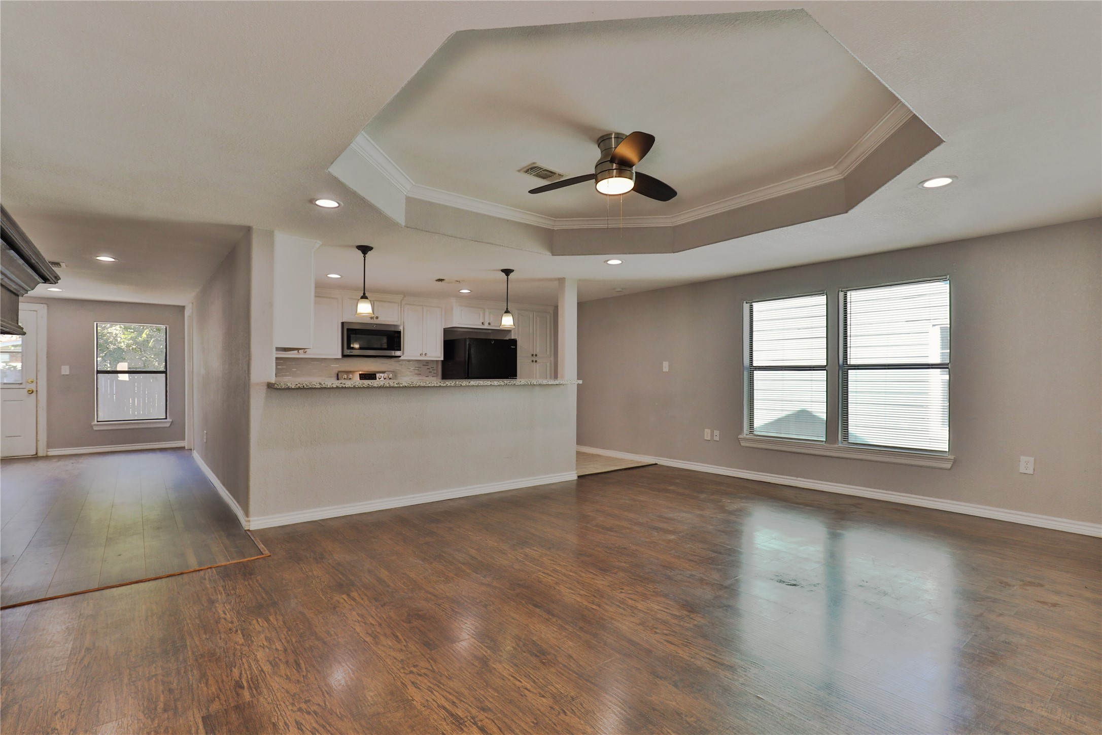 218 3 Rd Street Brazoria, TX 77422 - Photo 4 of 19 a view of an empty room with kitchen appliances and a window