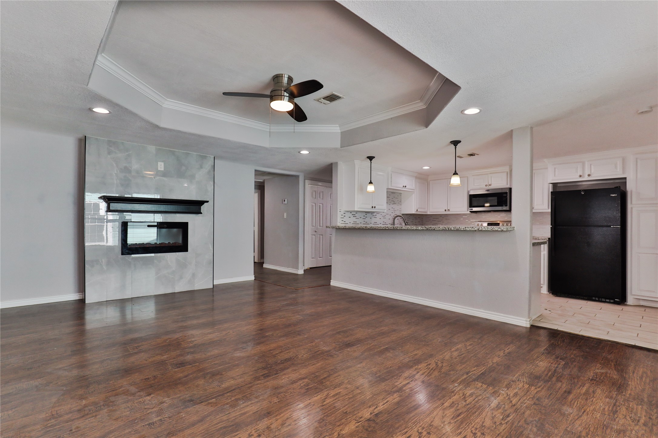 218 3 Rd Street Brazoria, TX 77422 - Photo 5 of 19 a view of a kitchen with a sink a refrigerator and window