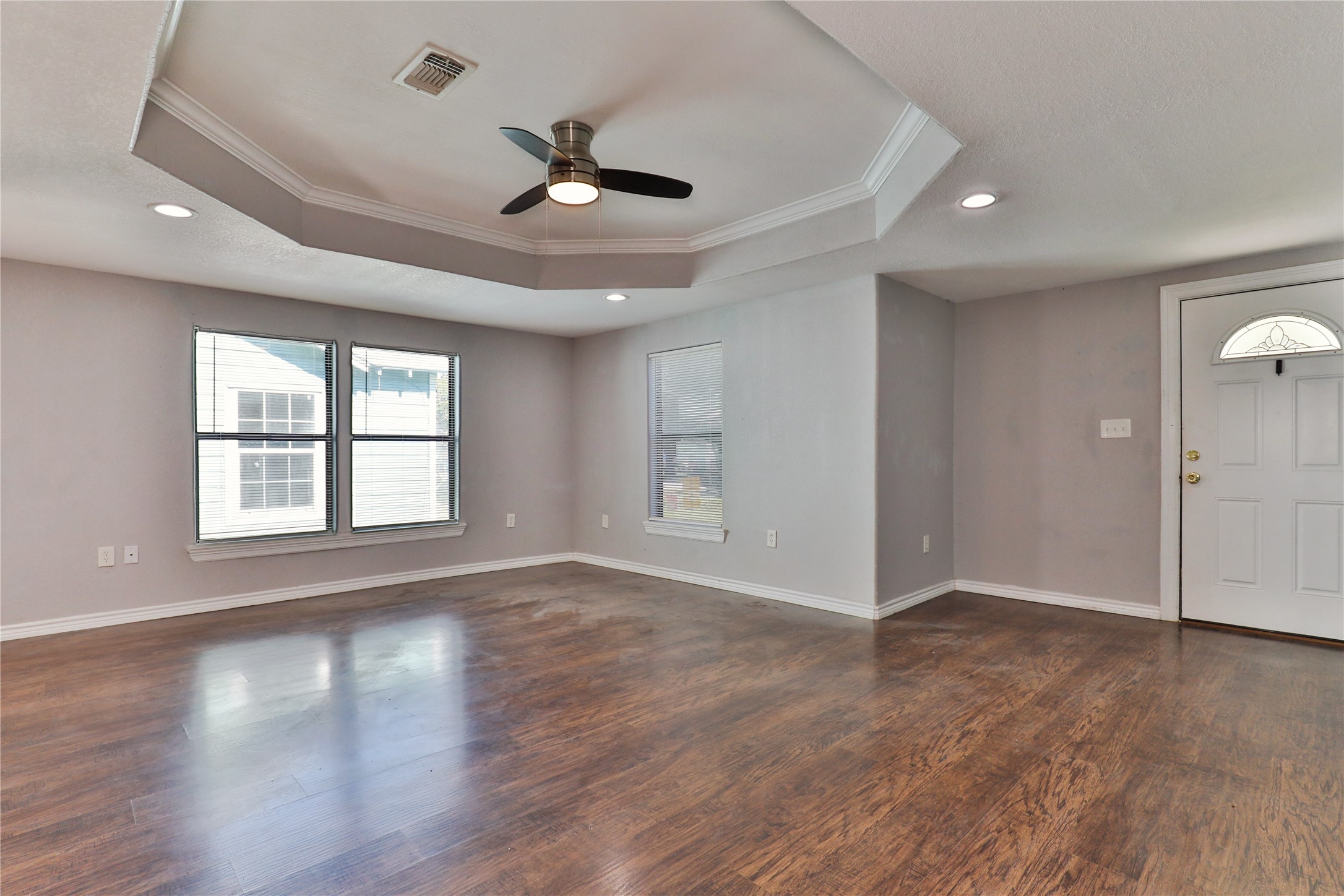 218 3 Rd Street Brazoria, TX 77422 - Photo 7 of 19 a view of an empty room with wooden floor and a window