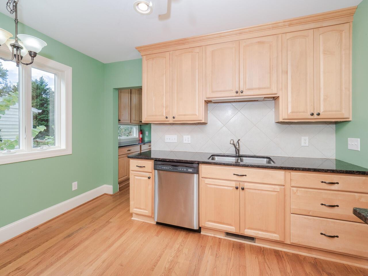 408 Morrison Avenue Raleigh, NC 27608 - Photo 8 of 29 Clean up is a breeze with sink and dishwasher within close proximity of each other. Kitchen Sink