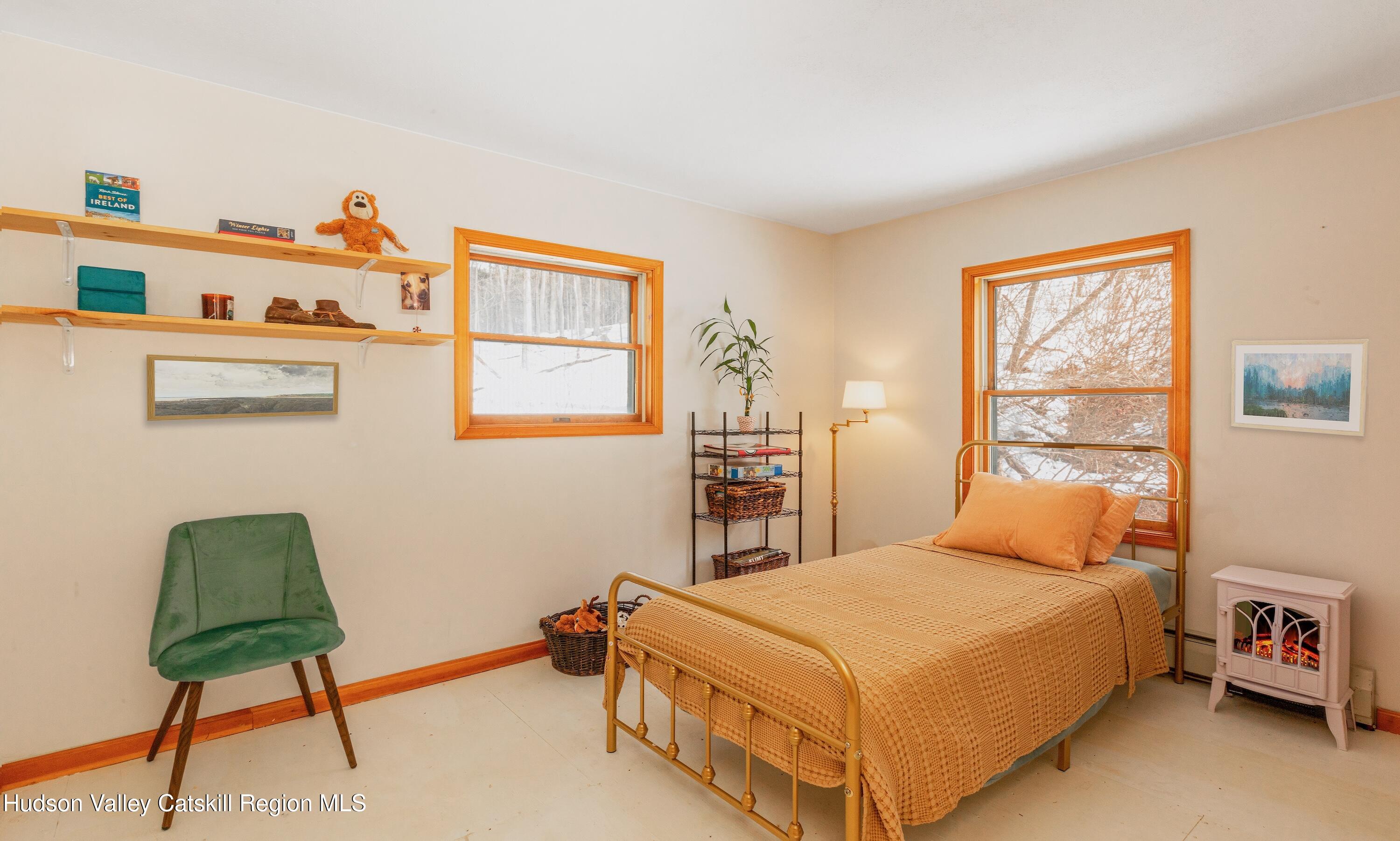 1046 Cow Hough Road New Paltz, NY 12561 - Photo 21 of 37 a bedroom with a bed and a closet