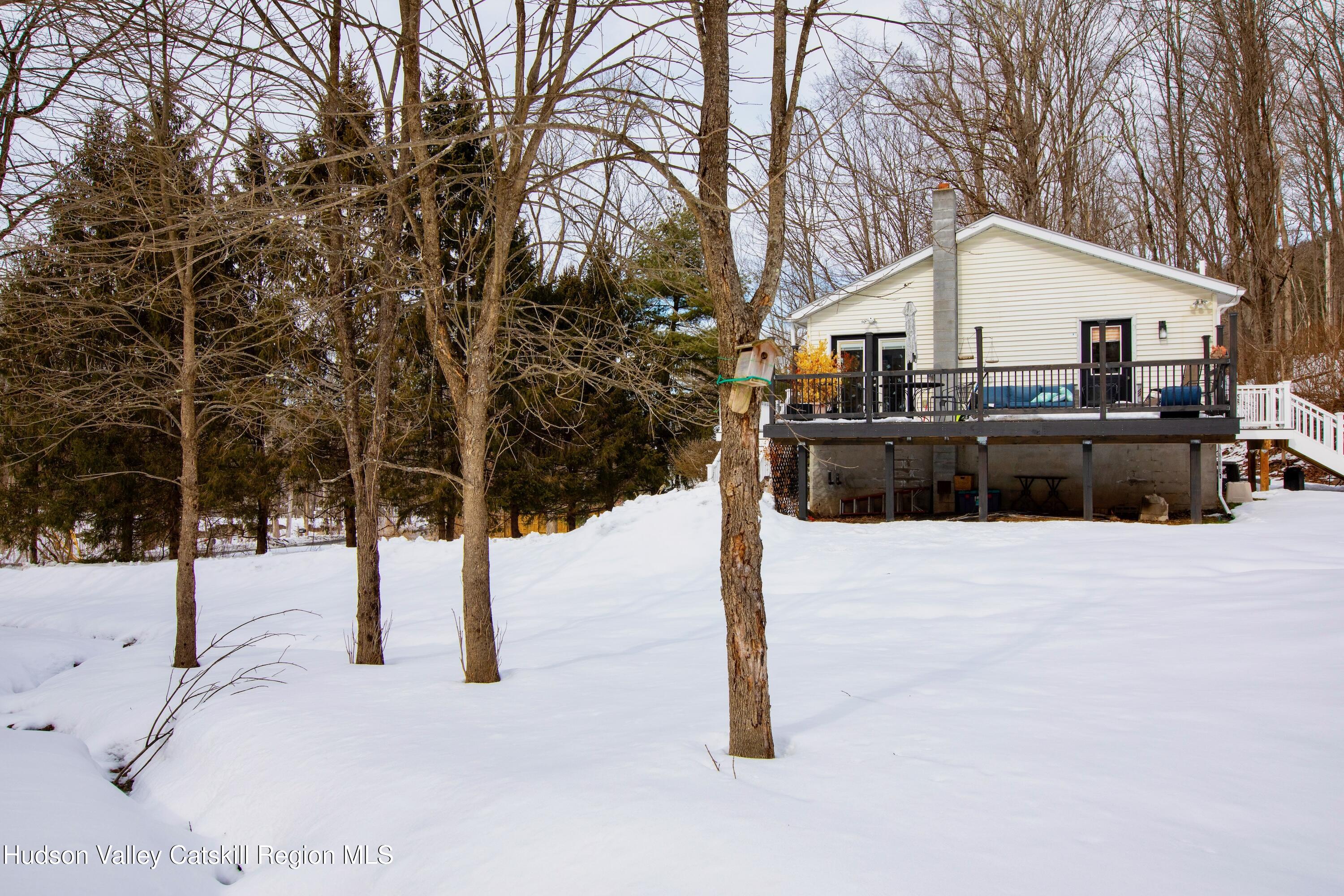 1046 Cow Hough Road New Paltz, NY 12561 - Photo 31 of 37 a view of a house with snow on the road
