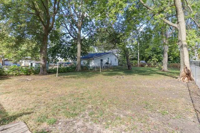 a house view with a garden space