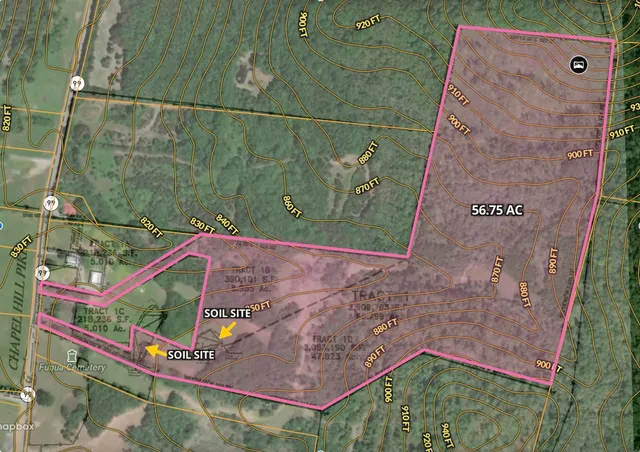 an aerial view of a wooden house