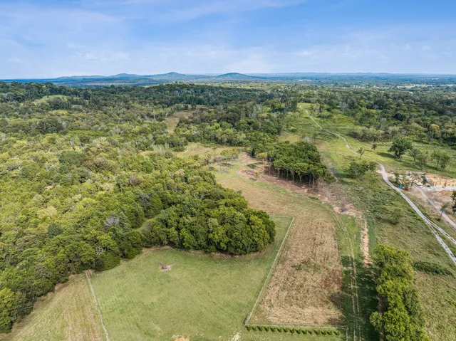 a view of a yard with an outdoor space