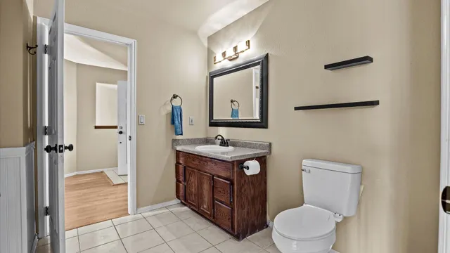a bathroom with a shower and a glass door
