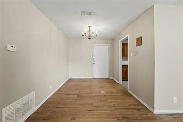a view of a livingroom with a chandelier