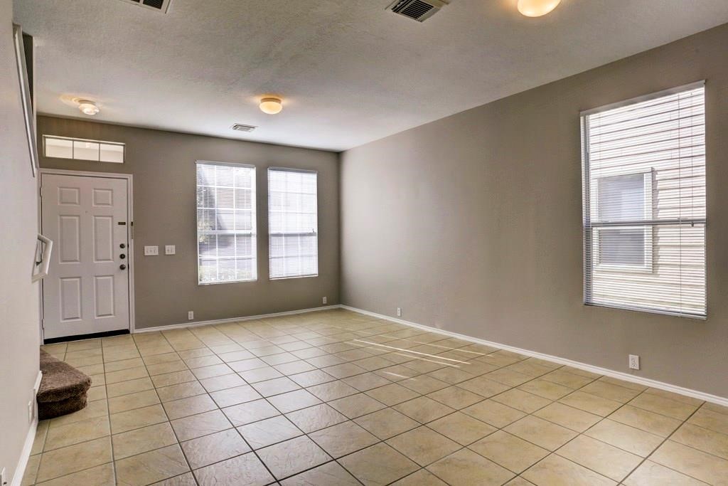 23830 Single Oak Street Spring, TX 77373 - Photo 3 of 10 a view of an empty room and window