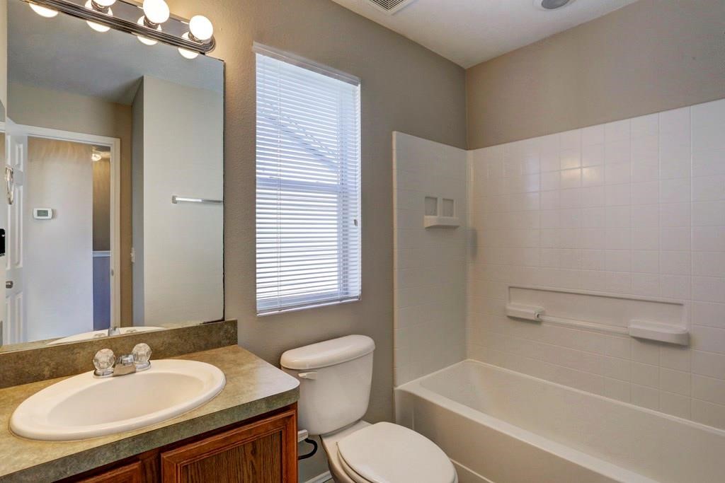 23830 Single Oak Street Spring, TX 77373 - Photo 9 of 10 a bathroom with a sink toilet and shower