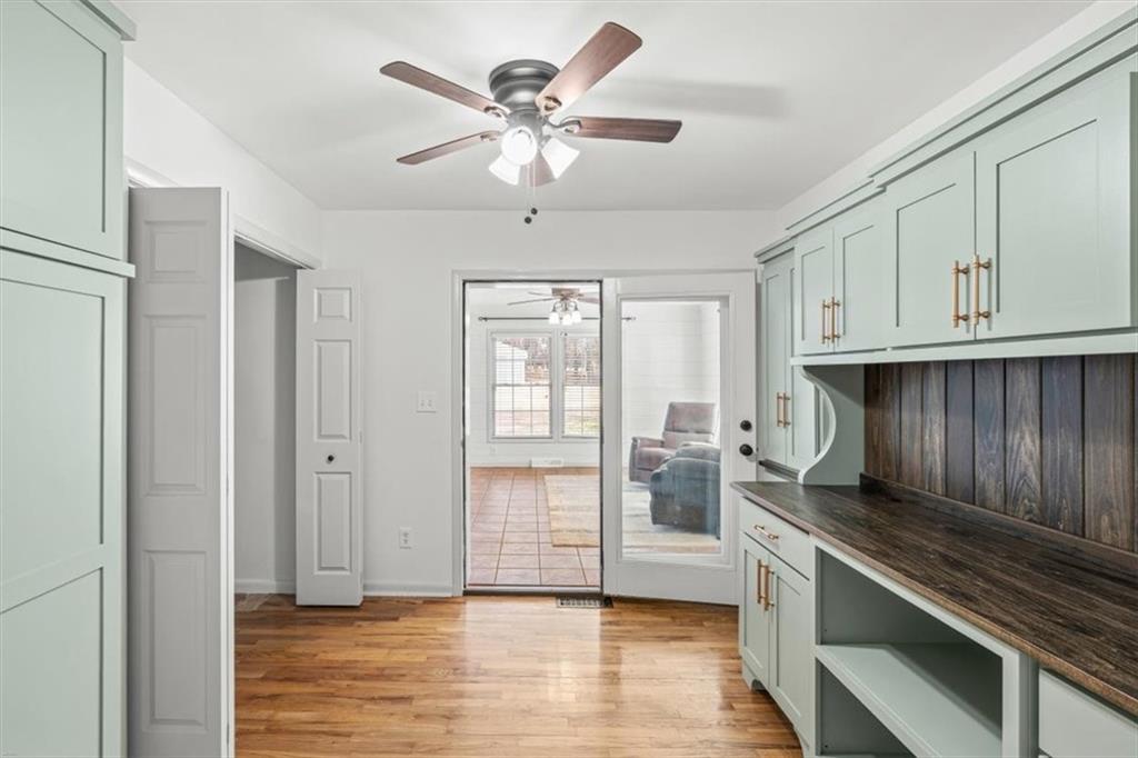 240 John Phillips Road Cedartown, GA 30125 - Photo 25 of 55 a kitchen with granite countertop a stove and a white cabinets