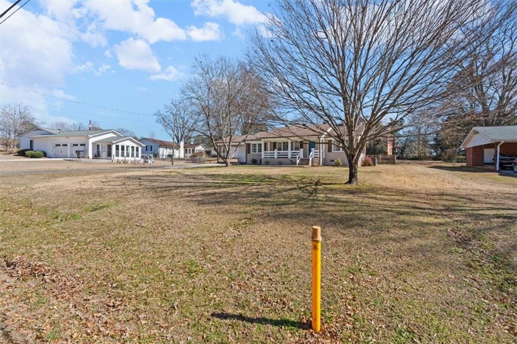 240 John Phillips Road Cedartown, GA 30125 - Photo 3 of 55 a view of a yard with a house in the background