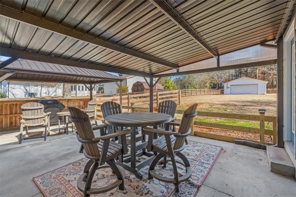 240 John Phillips Road Cedartown, GA 30125 - Photo 31 of 55 a view of a dining room with furniture window and outside view