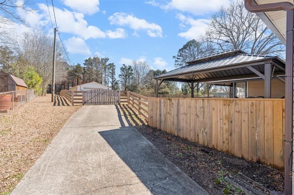 240 John Phillips Road Cedartown, GA 30125 - Photo 36 of 55 a view of a backyard with sitting area