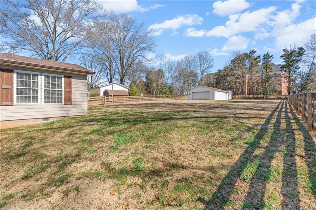 240 John Phillips Road Cedartown, GA 30125 - Photo 38 of 55 a house view with swimming pool in front of it