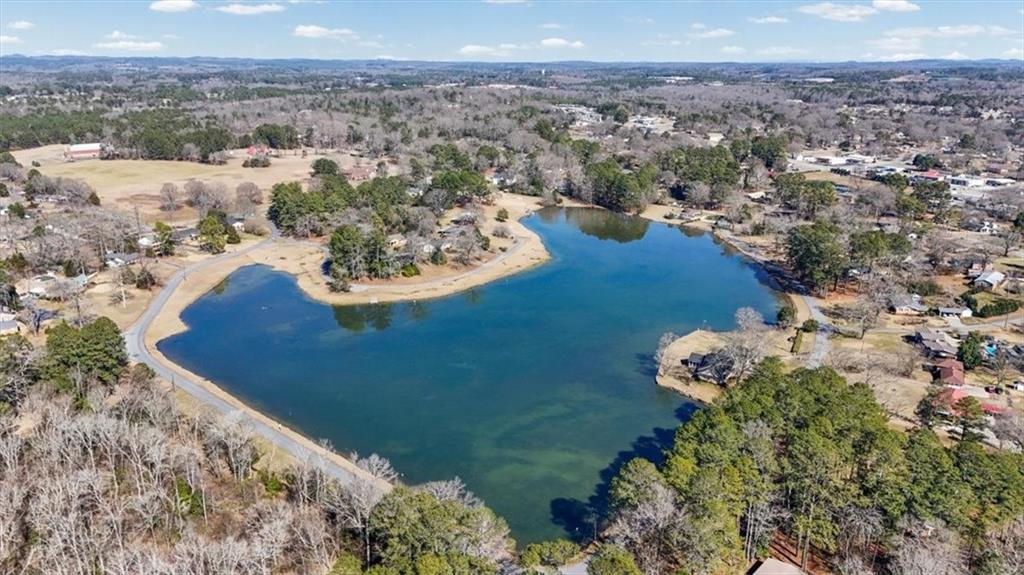 240 John Phillips Road Cedartown, GA 30125 - Photo 54 of 55 a view of a lake with a mountain in the background