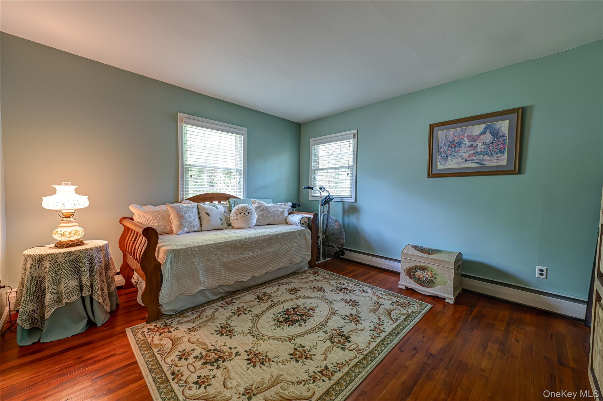 3 Thompson Hill Road St. James, NY 11780 - Photo 20 of 34 a bedroom with a bed and window