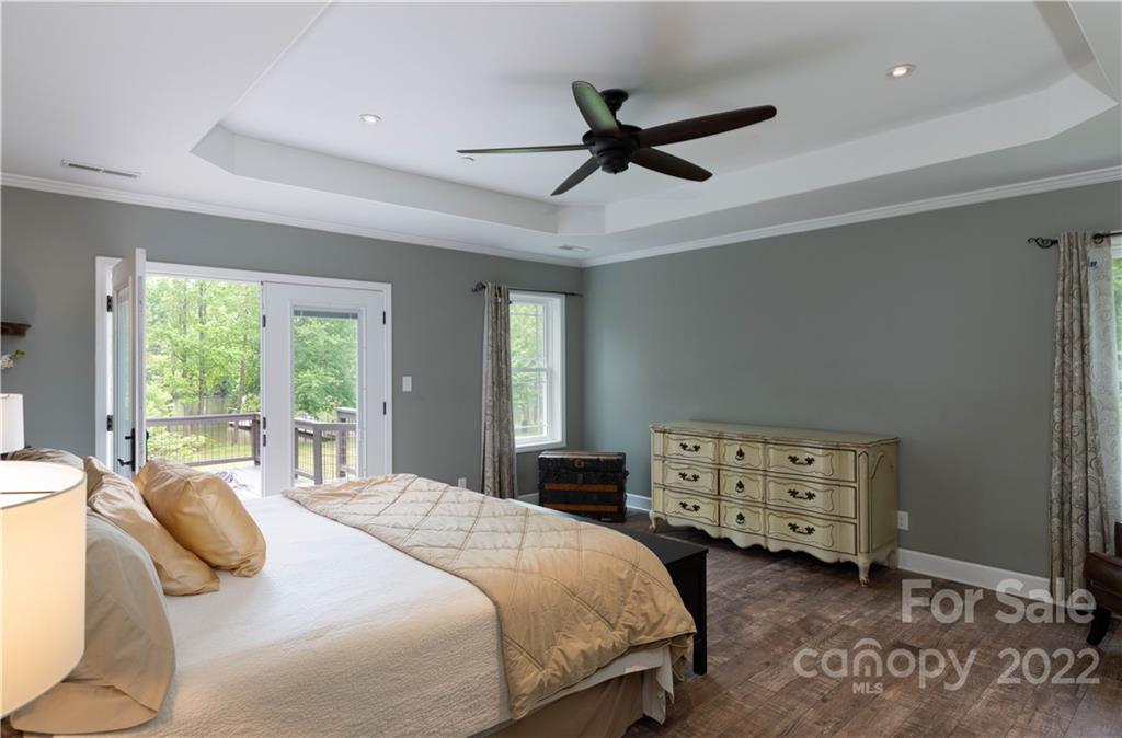 1279 Lake Road Clover, SC 29710 - Photo 16 of 44 a bedroom with a bed a window and a dresser