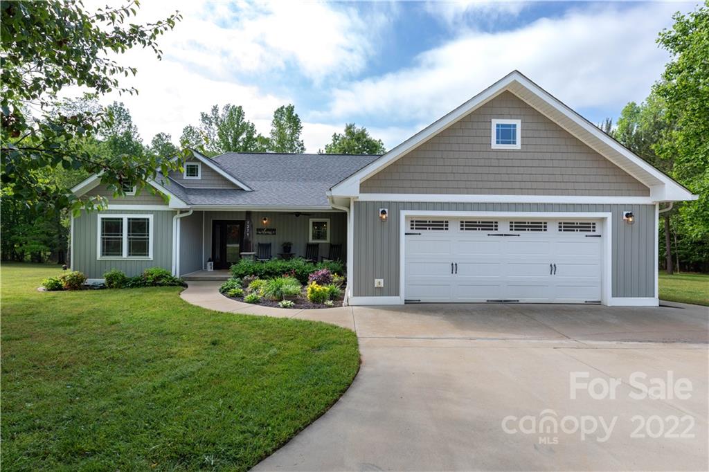 1279 Lake Road Clover, SC 29710 - Photo 2 of 44 a front view of a house with a yard and garage